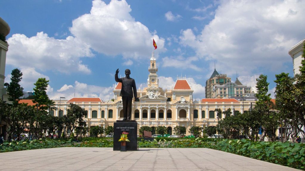 The old city hall with the statue of Ho Chi Minh, Vietnam