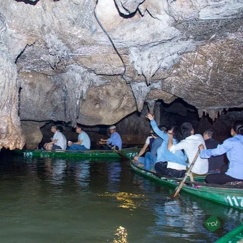 Boat ride through cave Trang An